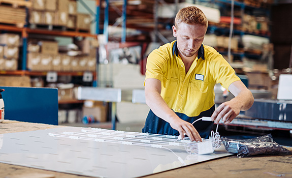 Engineer working on fuses and electric parts